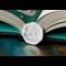The 2020 Official Peter Pan 50p Coin Reverse leaning against open book