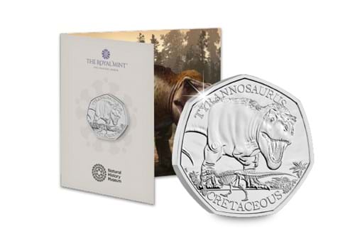 T Rex BU Coin In Front Of Pack
