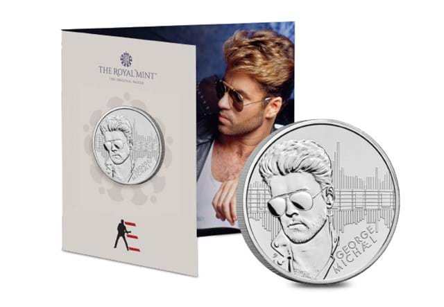 697G George Michael BU £5 Coin In Front Of Packaging Whole Image