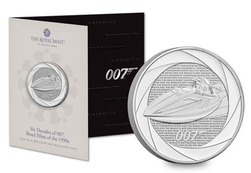 737Q UK 2024 Six Decades Of 007 1990S BU £5 Pack Coin In Front Of Packaging Whole Product