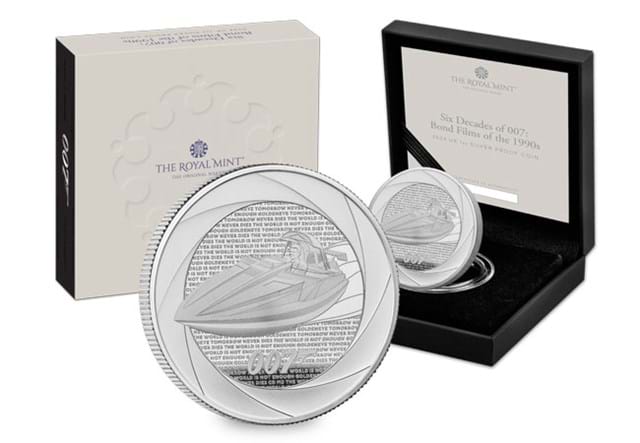 PUU4 UK 2024 Six Decades Of 007 1990S 1Oz Silver Coin In Front Of Packaging Whole Product