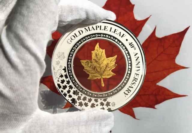 2019 Maple Leaf Embracing Gold 2Oz Silver Coin In Hand