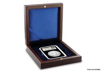 A Wooden Presentation Case for storage of a single DateStamp™ capsule. Featuring mahogany wood grain finish and royal blue interior.
