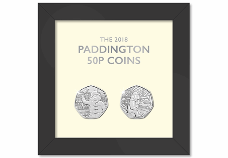 BOTH of the 2018 UK Paddington 50p coins in BU quality displayed together in a purpose built frame and certificate of authenticity.