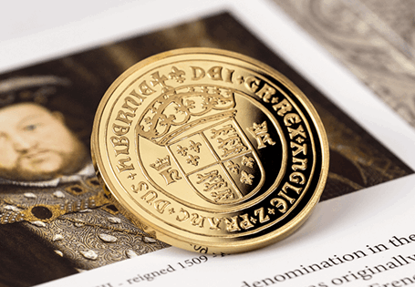 A replica gold plated crown of the Henry VIII Crown of the Double Rose. This replica features a Tudor rose on the obverse and a crowned shield on the reverse.