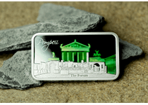 This coin bar has been struck from 1oz of Pure Silver to a pristine proof finish. Featuring an image of Pompeii's ruins in present day and a holographic image of the Temple of Apollo.