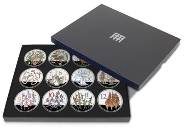 DN 12 days of christmas medals set in box.jpg