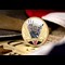 The VE Day 75th Anniversary Gold-Plated Coin reverse with colourful background