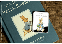 The Official Peter Rabbit™ Commemorative features a full colour image of a mischievous young Peter Rabbit. The obverse features the Peter Rabbit logo.