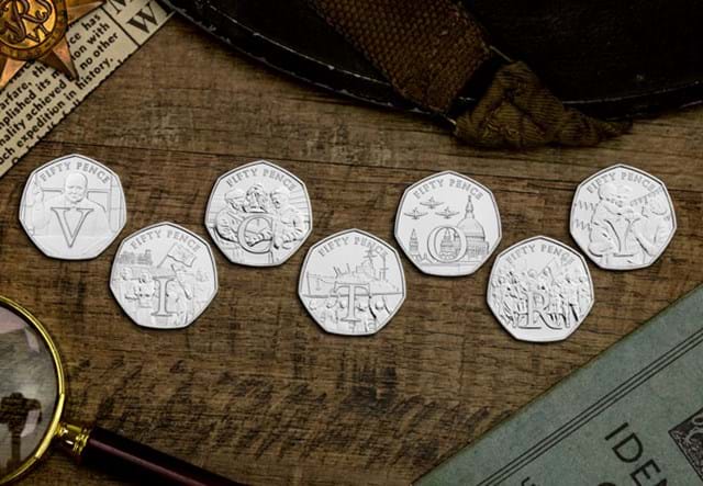 The Complete Victory BU 50p Collection reverses on wooden surface
