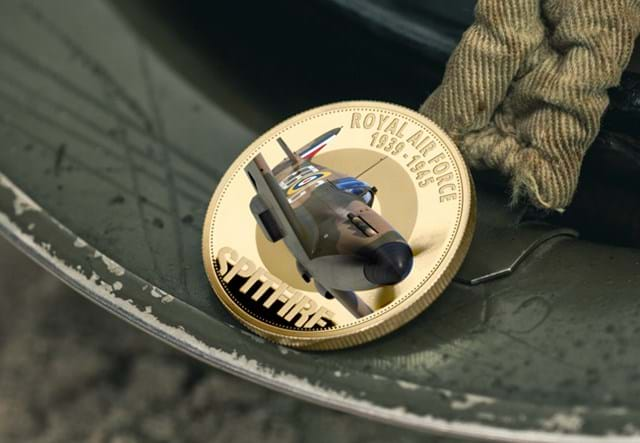 The RAF Battle of Britain Spitfire Coin reverse on metal surface