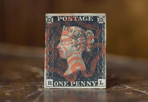 The 1840 Penny Black Stamp on brown surface