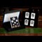 The Prince Philip Memorial Historic Coin and Stamp Collection on wooden surface
