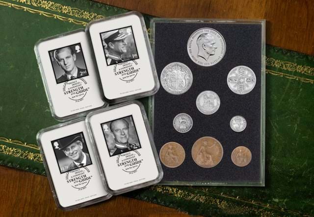 The Prince Philip Memorial Historic Coin and Stamp Collection laid on green and brown surface