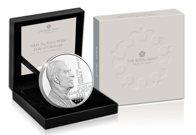 UK 2021 Prince Philip £5 Silver Proof Coin in display box beside pack