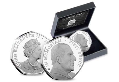 The Prince Philip Silver Proof Portrait 50p Obverse and Reverse beside display box.jpg
