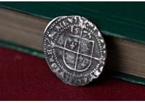 A Queen Elizabeth I Silver Tudor Threepence presented in a wooden display box with a Certificate of Authenticity.