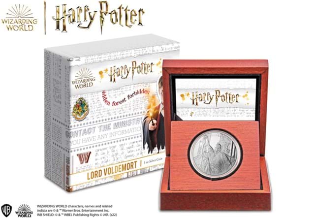 The Voldemort 1oz Silver Coin in display box beside packaging