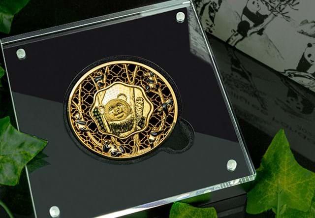 Gold Edition Filigree Panda Coin in box with green leaves