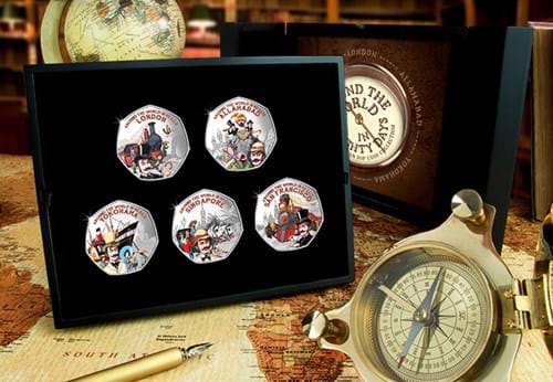 Around the World in 80 Days Silver 50p Set in open display box beside a compass