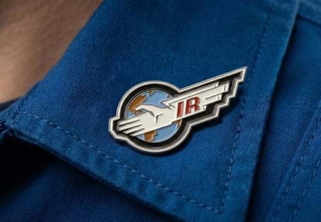 This pin badge features the International Rescue logo from Thunderbirds