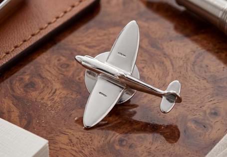 This premium pin badge has been crafted from .925 Sterling Silver and a genuine piece of aluminium reclaimed from Spitfire P7350.